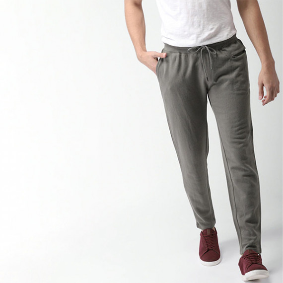 http://15.207.65.201/products/men-grey-regular-fit-solid-track-pants